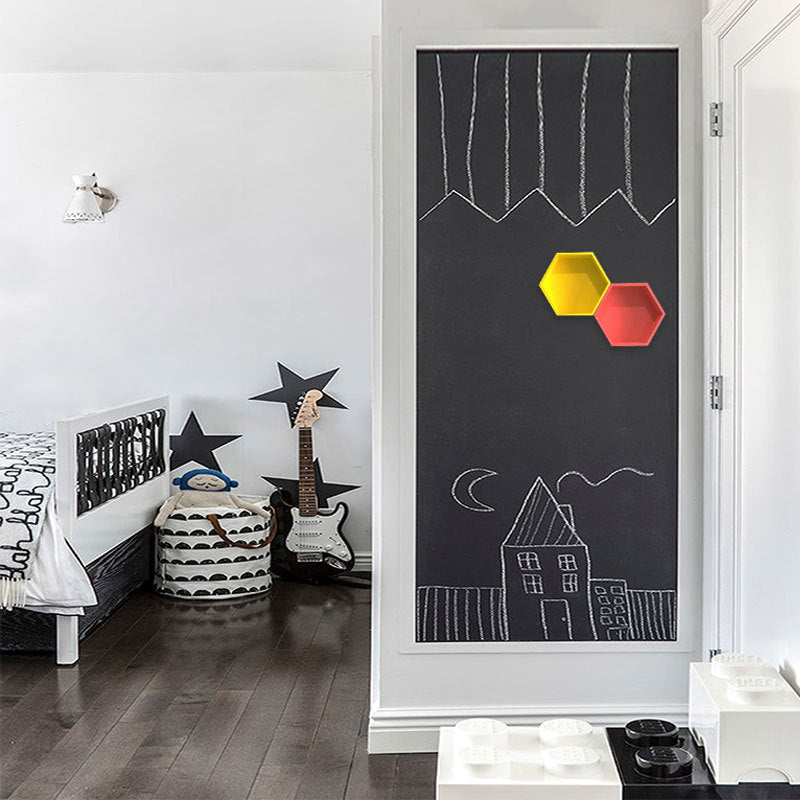 A framed chalkboard wall sticker featuring abstract lines and geometric shapes in yellow and red on a black background.
