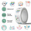 A roll of cartoon tooth fairy stickers featuring various tooth designs and characters for kids and teens
