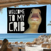 A black banner featuring a cartoon duck face saying Welcome to My Crib against a blue ocean backdrop.