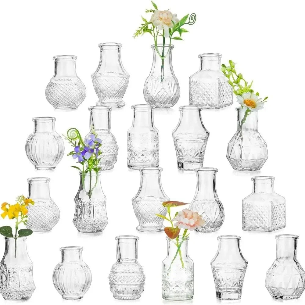 A collection of diamond faceted glass bud vases in various shapes and sizes for home decor