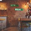 A rustic interior wall features vintage metal signs spelling out ELM St. on a brick background.