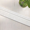 White self-adhesive 3D wall trim line with ornate scroll pattern for modern home decor