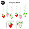 A set of six hanging swirl strawberry decorations for a birthday party, including fruit shapes and leaves.