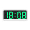 A digital alarm clock displaying the time 18:08 in bright green LED digits.