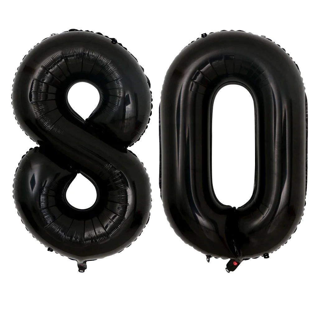 A set of two giant black foil balloons shaped like the number 80