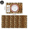 A set of five leopard print foil balloons for party decorations, including a plate and cutlery.