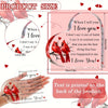 A pink heart-shaped acrylic keepsake with a red bird design, showing text like I love you.