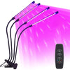 A USB LED plant grow light with multiple brightness levels and a timer is shown illuminating a pink background.