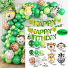 A green and white balloon garland arch kit featuring safari animals like a lion, tiger, and zebra, with palm leaves.