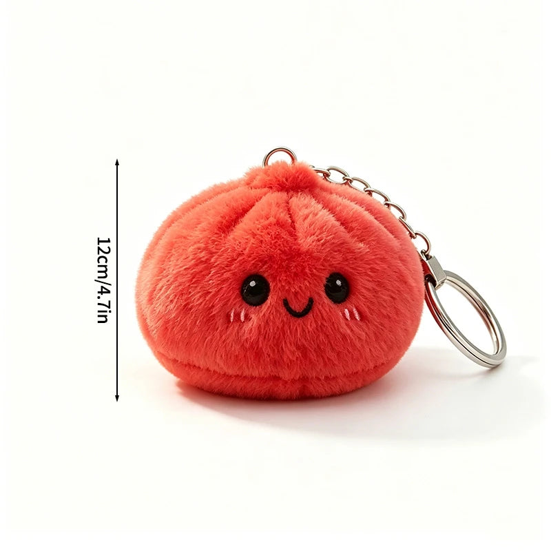 A round, bright orange-red plush butter dumpling squishy keychain with a smiling face.