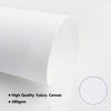 Roll of white fabric canvas material for printing, showing a close-up texture and thickness.