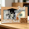 A wooden box featuring a graduation theme with the name Jack and congrats for the Class of 2026