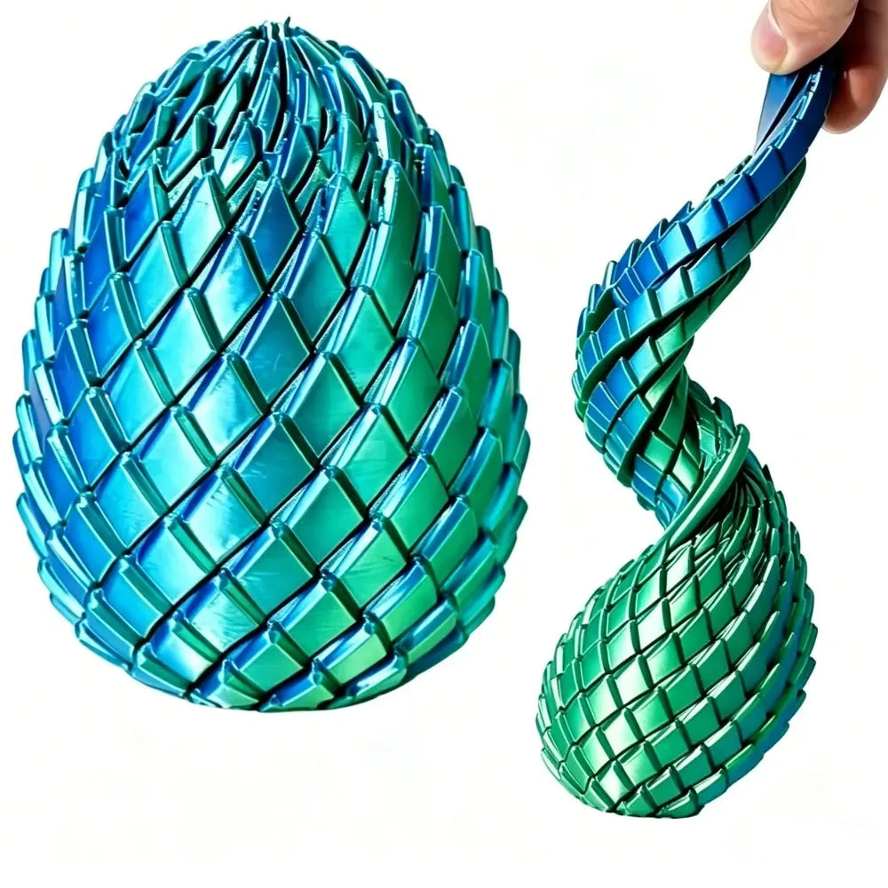 A close-up of a teal dragon egg fidget toy with a textured, scale-like surface being held by a hand.