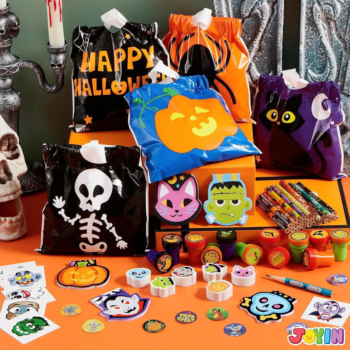 A collection of Halloween stationery and trick-or-treat bags featuring spooky characters, pumpkins, and seasonal designs.