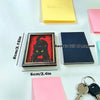 A black cat photo frame with a red background is displayed next to yellow and pink magnetic note cards.