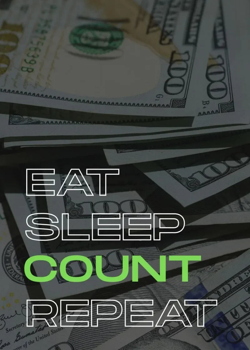 لقطة مقربة لعملات الدولار الأمريكي مع النص 'EAT SLEEP COUNT REPEAT' فوقها.