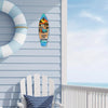 A wooden tiki bar sign featuring a tropical scene is mounted on a light blue wooden wall next to a large blue and white strip