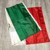 A folded banner displaying the green, white, and red colors of the Mexican flag.