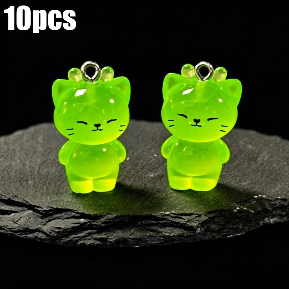 Ten glow-in-the-dark lime green cartoon kitty duck resin charms for DIY jewelry