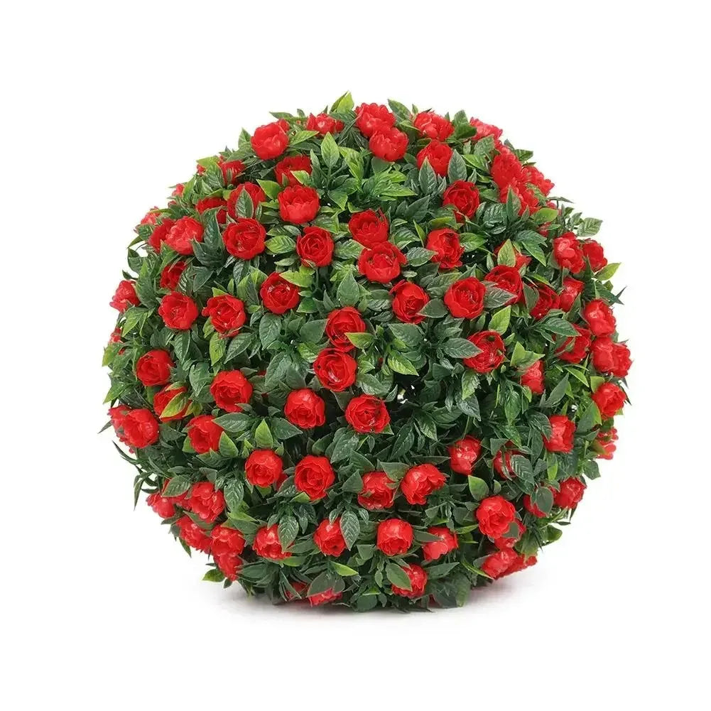 A dense sphere of artificial red roses and green foliage used for decoration.