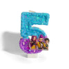 A large, bright blue glitter number 4 candle with three small character figurines on the base.