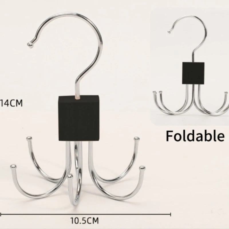 Silver foldable multi-claw hanger with a black square hook for closet organization