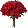 A bouquet of realistic artificial red poinsettia flowers for Christmas and holiday decor.