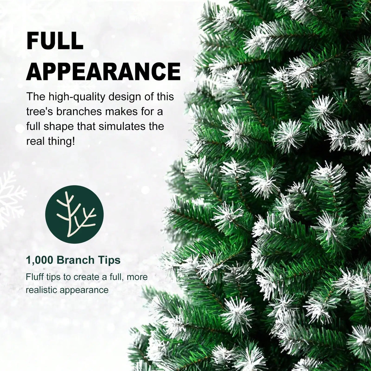 Close-up of a green artificial Christmas tree with white flocked branches.