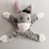 A gray plush animal figurine resembling a donkey or horse with pink ears and white accents.