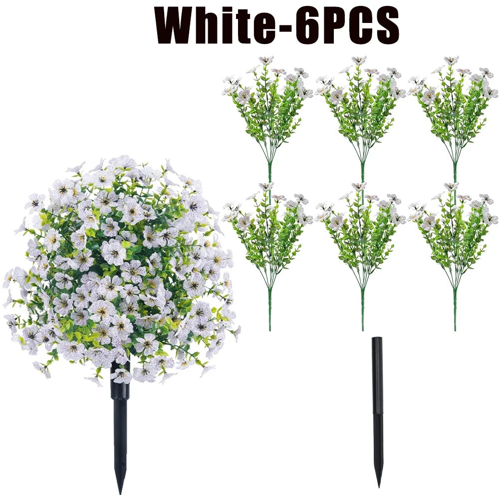 Six bunches of white artificial flowers on stems for outdoor and indoor decoration