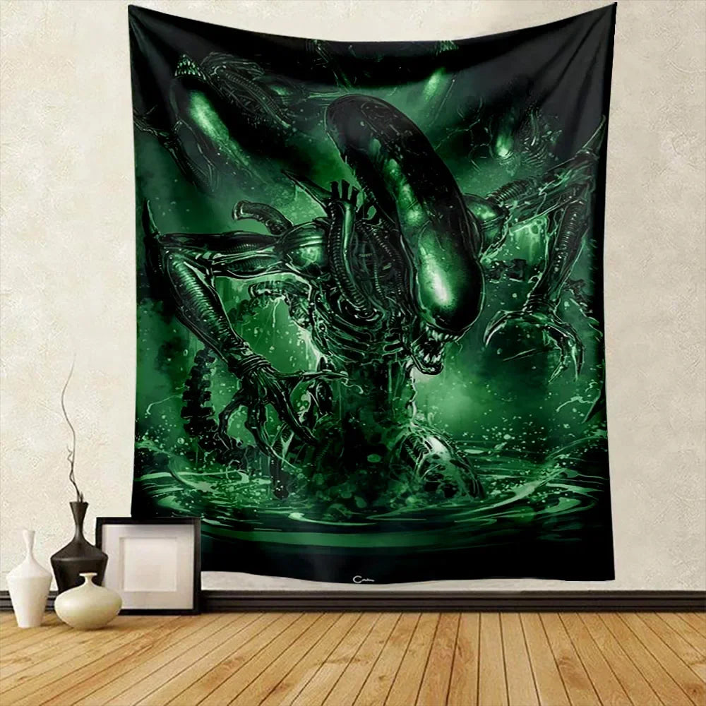 A dark green tapestry wall hanging featuring a menacing alien predator design.