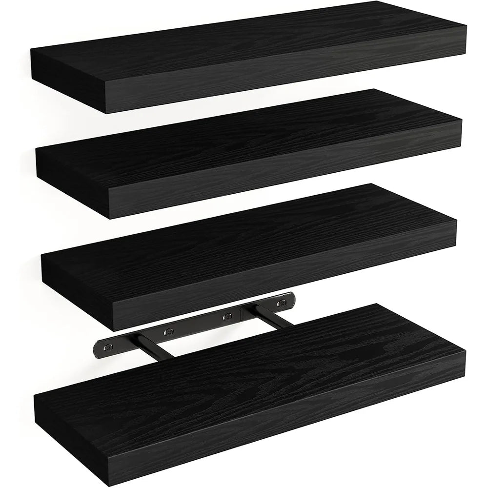 A set of three black wooden floating wall shelves with a mounting bracket.