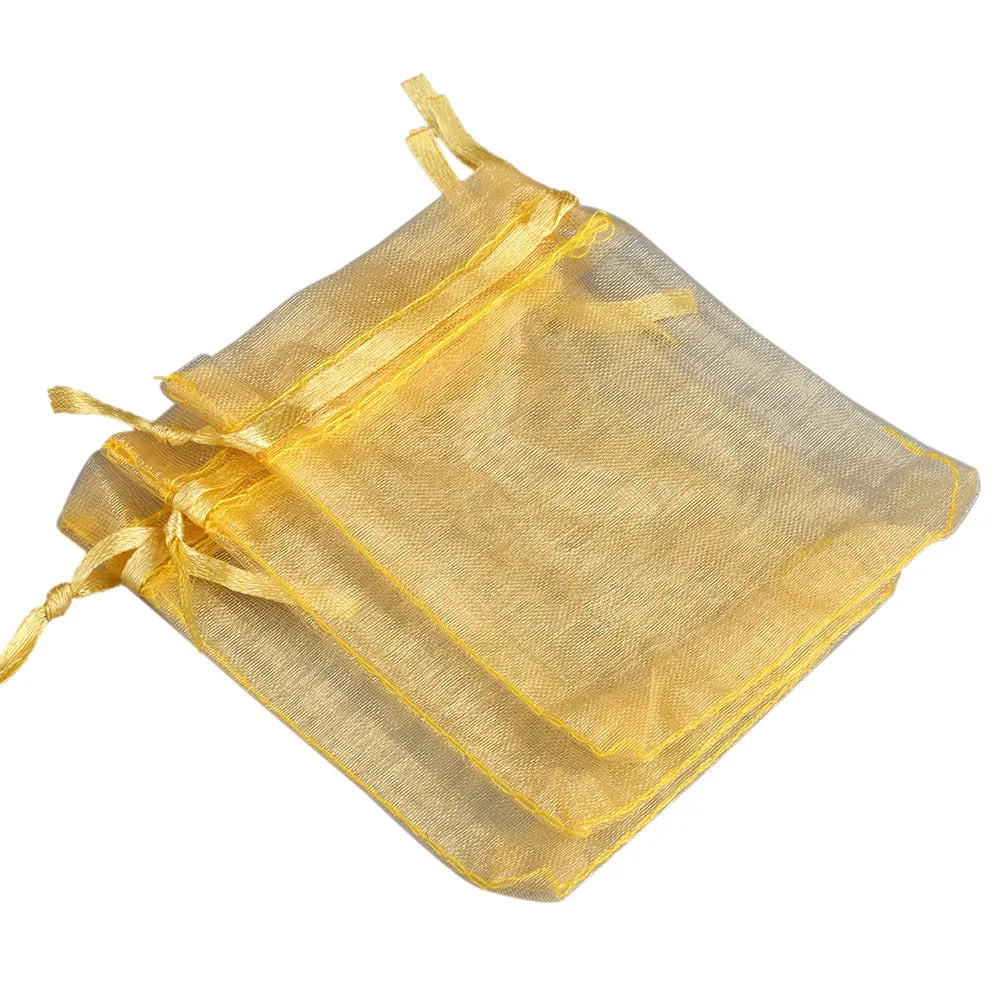 A golden yellow organza drawstring gift pouch for jewelry, candy, or party favors.
