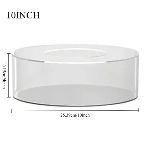 A clear acrylic cake display stand with a 10-inch diameter and 1.15-inch height.
