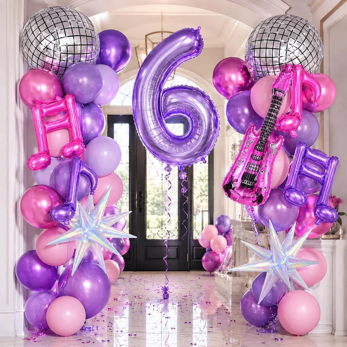 A collection of purple and pink balloons shaped like the number six and a guitar for a K-Pop birthday party decoration set