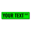 A bright green rectangular sign with the text YOUR TEXT TEXT.