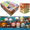A collection of Jujutsu Kaisen blind box collectible figures displayed in front of their packaging.