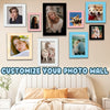 A collection of framed photos and artwork displayed on a wall above a bed.