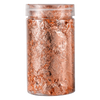 A clear jar filled with shiny gold foil flakes for resin art and jewelry making