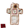 Handmade prayer quilt featuring a cross with decorative elements and a silver cross pocket shrine.