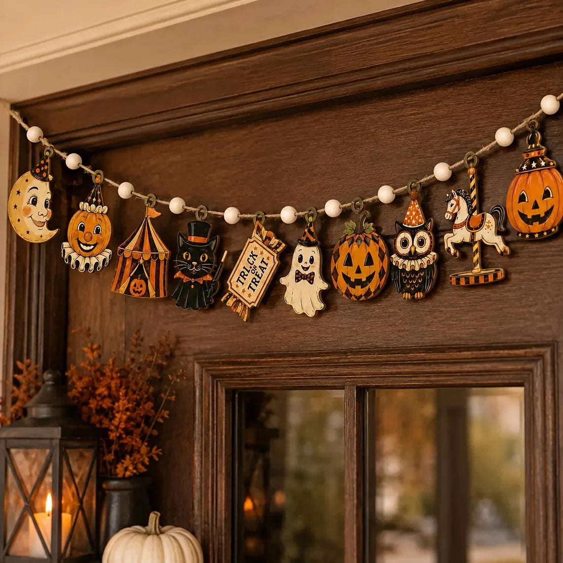 Vintage wooden Halloween flag set featuring pumpkins, ghosts, and moons displayed on a rustic wall.