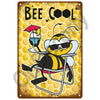 A vintage metal sign featuring a cartoon bee wearing sunglasses and holding a drink, set against a yellow honeycomb backgroun