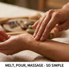 A hand is applying a clear oil onto another person's skin for massage, demonstrating the simple melt pour process.