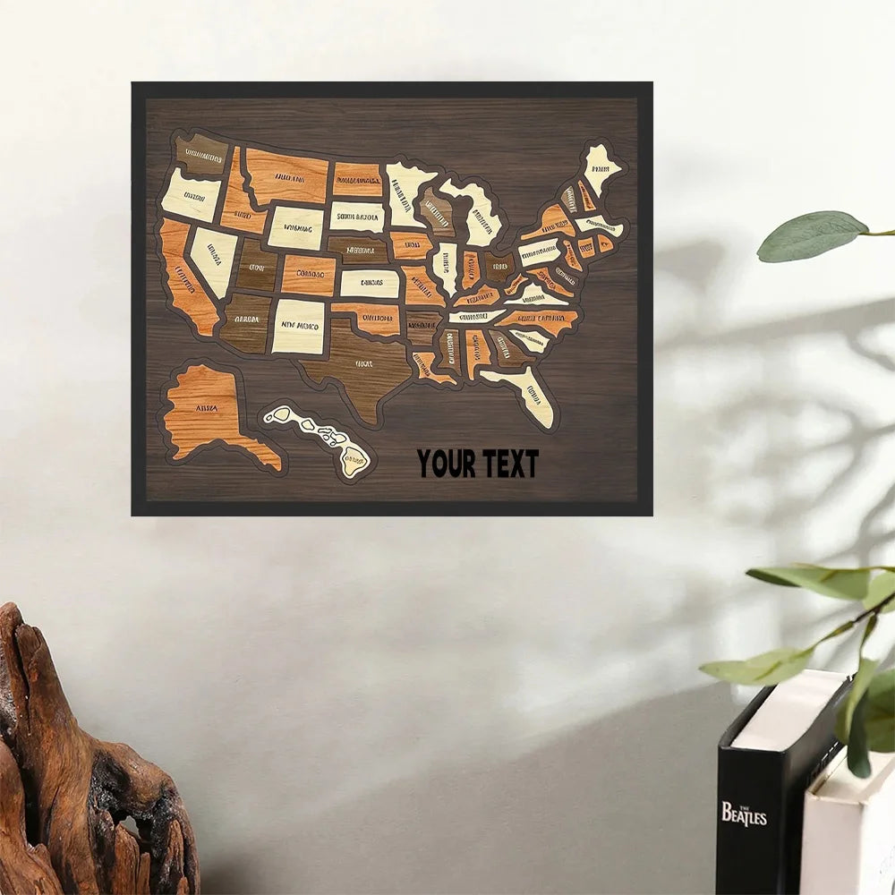 A framed wooden map of the United States with state outlines and text, displayed on a light gray wall.