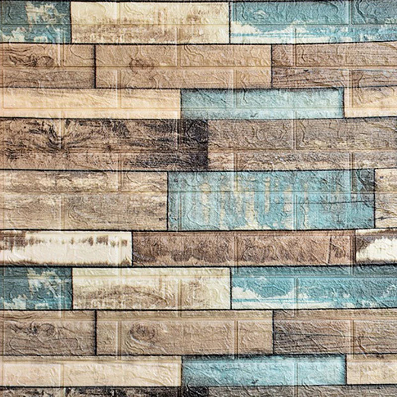 A textured wall panel design featuring rectangular blocks in shades of beige, brown, and light blue.