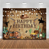 A rustic western scene featuring a barn door background with cacti, guitars, and cowboy elements for photography.