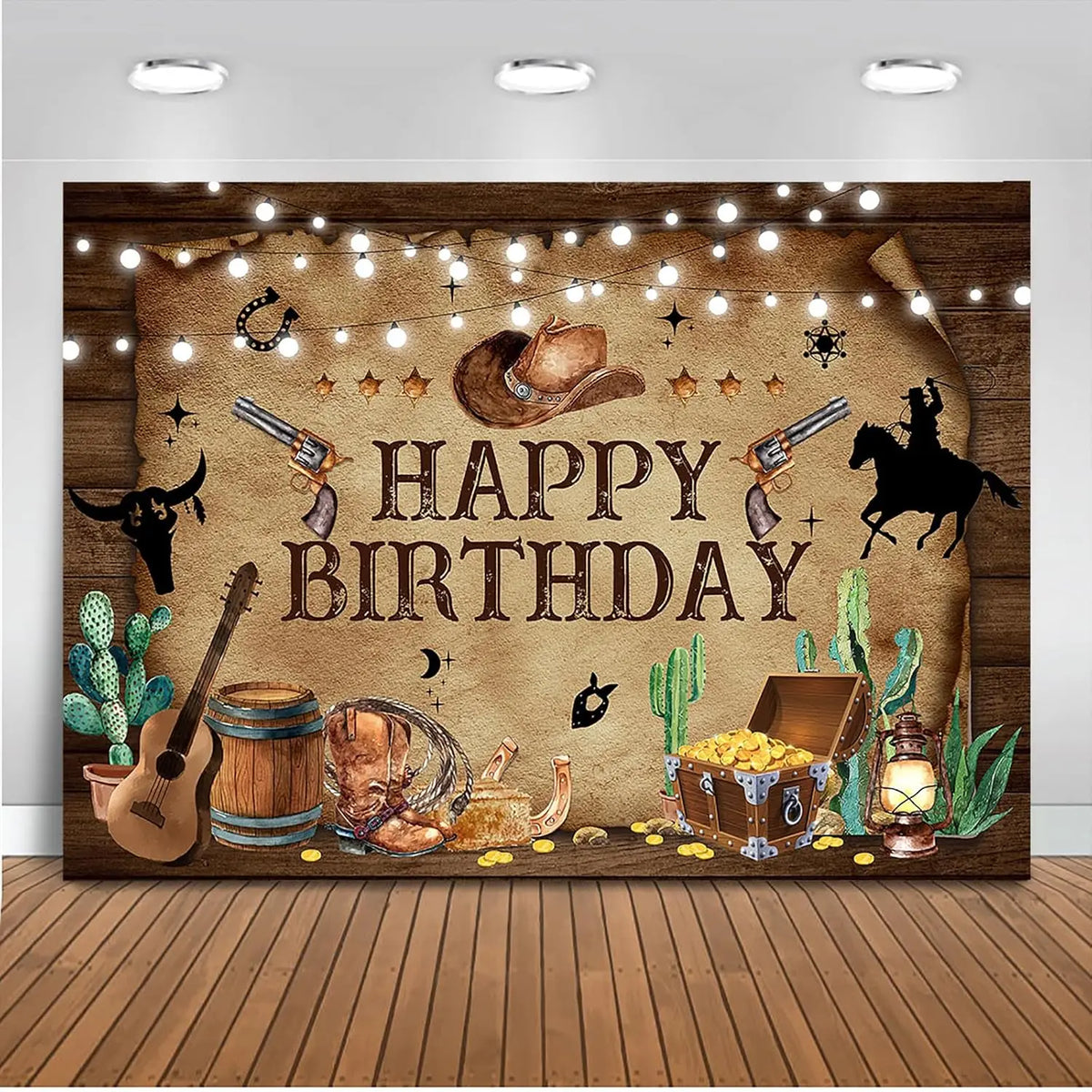 A rustic western scene featuring a barn door background with cacti, guitars, and cowboy elements for photography.