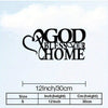 Black metal wall decor featuring the text GOD BLESS YOUR HOME in a stylized script font