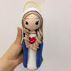 Handcrafted Virgin Mary crochet doll with a white veil and blue robe