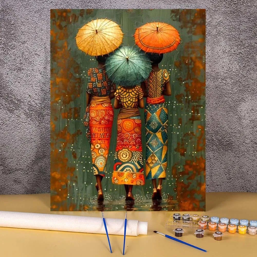 A painting by numbers kit depicting an African woman with a vibrant orange hat and traditional attire.